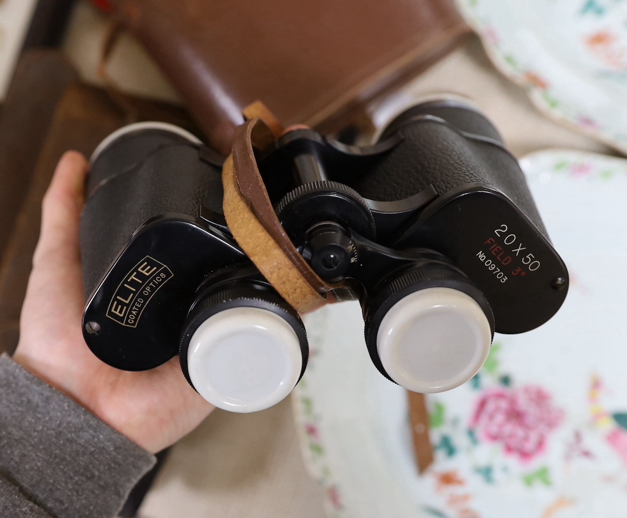 A Kodak camera and pair of binoculars